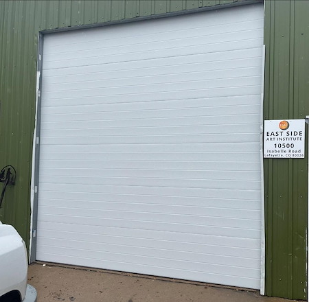 Commercial overhead doors in longmont choosing high speed vs insulated roll up doors
